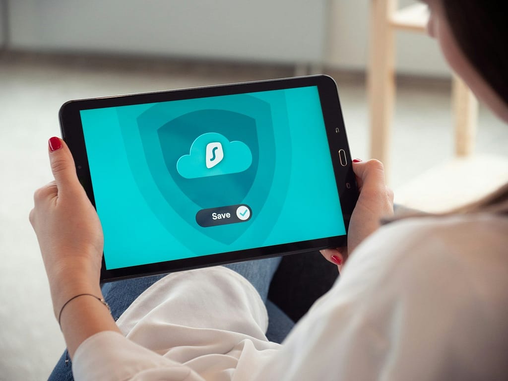 person holding black tablet computer, tablets for students