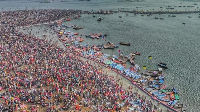 Arial view of crowds and boats during Kumbh Mela at Triveni Sangam, Prayagraj. Maha Kumbh Yatra